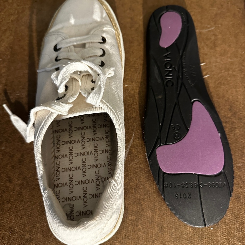 Vionic cream sneakers with tweed trim atβ white wall. Shoes feet love. Size 9 - Picture 14 of 16